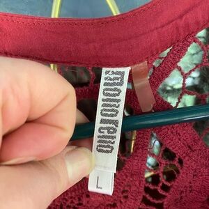 Cool, casual tunic with buttons up top and lace detail.